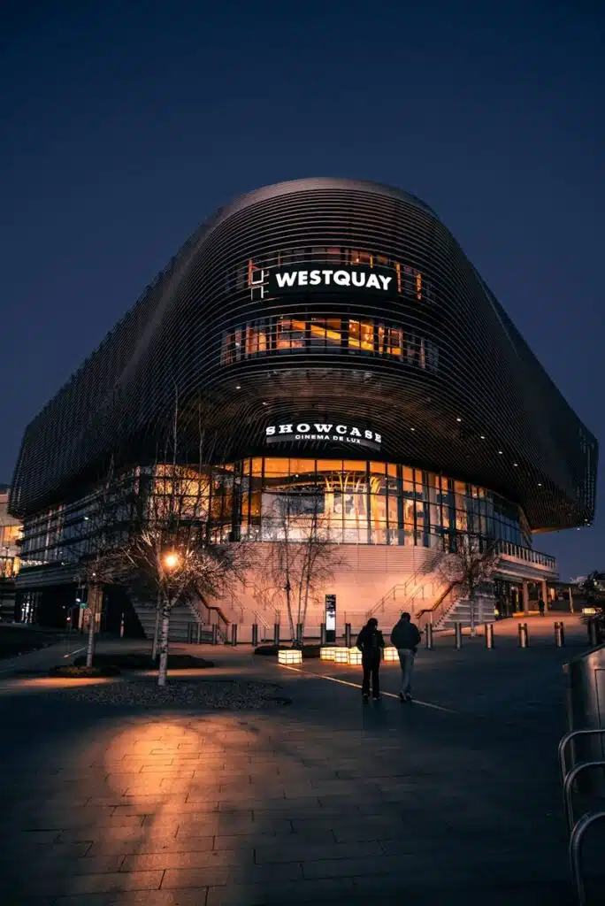 Night view of Westquay Shopping Centre in Southampton, illuminated and urban setting with acoustic and noise consultants based in the south east and Hampshire.